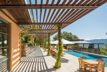 Patio with sunshade and pool