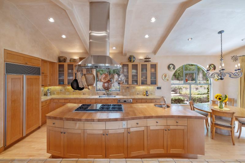 Kitchen with curved cabinetry